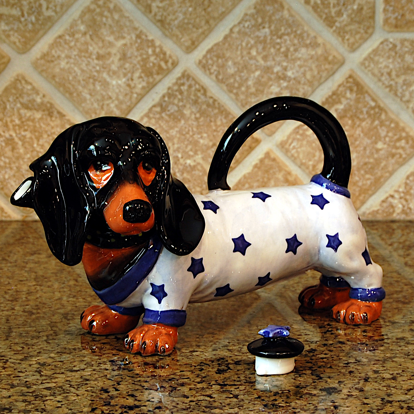 This Willie Dachshund Dog Teapot Collectible Decorative Home Décor Blue Sky Clayworks is made with love by Premier Homegoods! Shop more unique gift ideas today with Spots Initiatives, the best way to support creators.