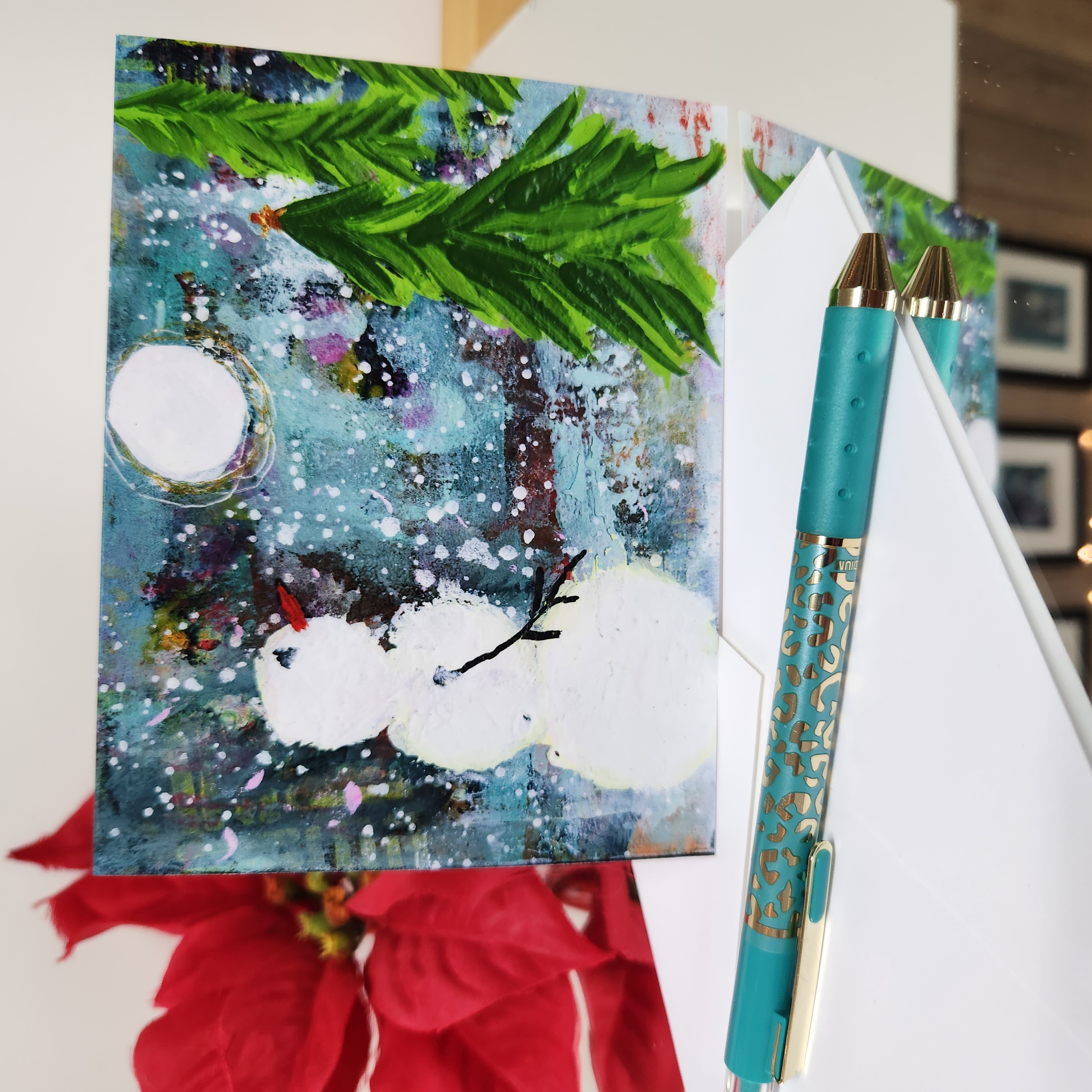 Winter Wonder - A2 size holiday  greeting  card with a snowman forest scene on the front. Patty Donahue artist