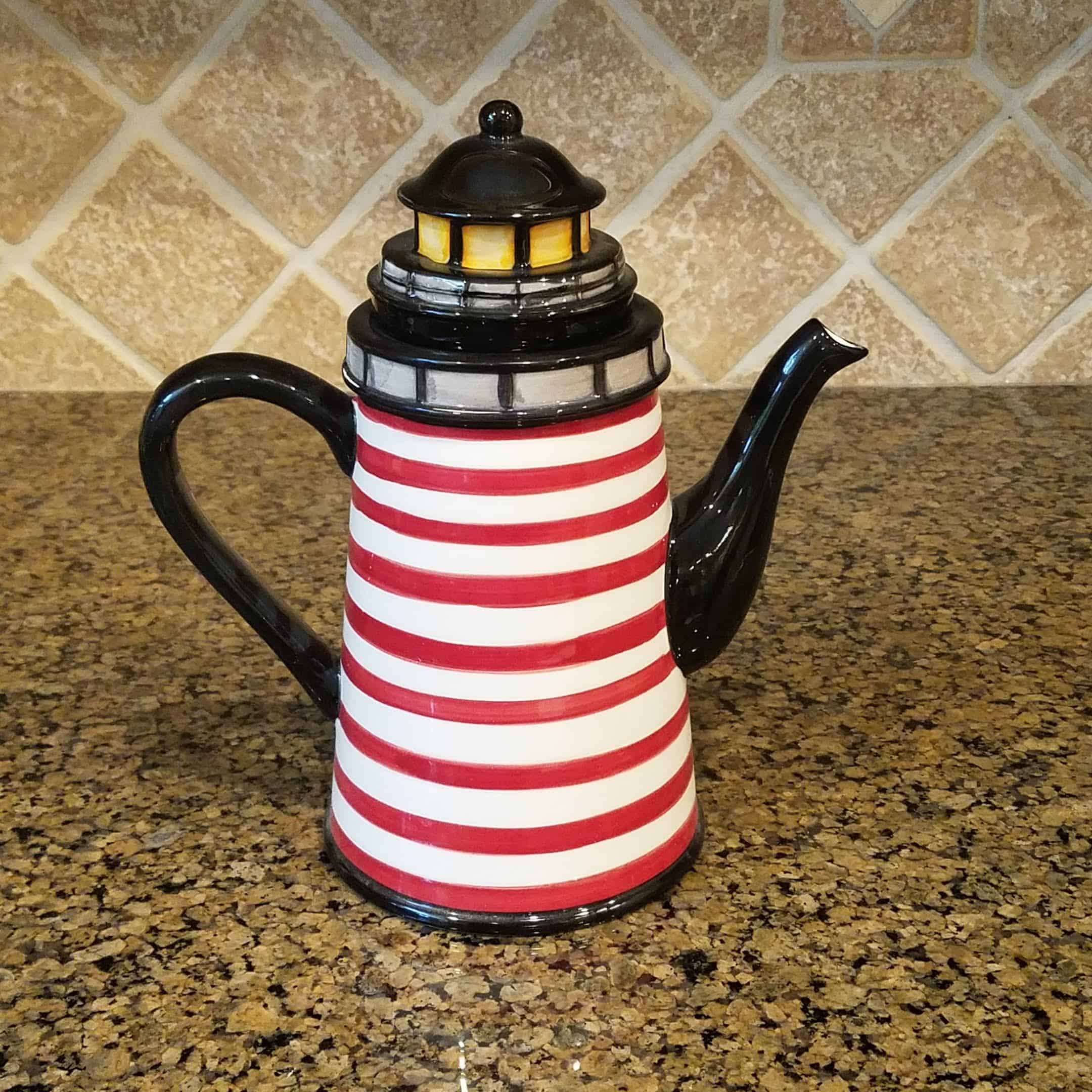 This Beacon Lighthouse Teapot is made with love by Premier Homegoods! Shop more unique gift ideas today with Spots Initiatives, the best way to support creators.