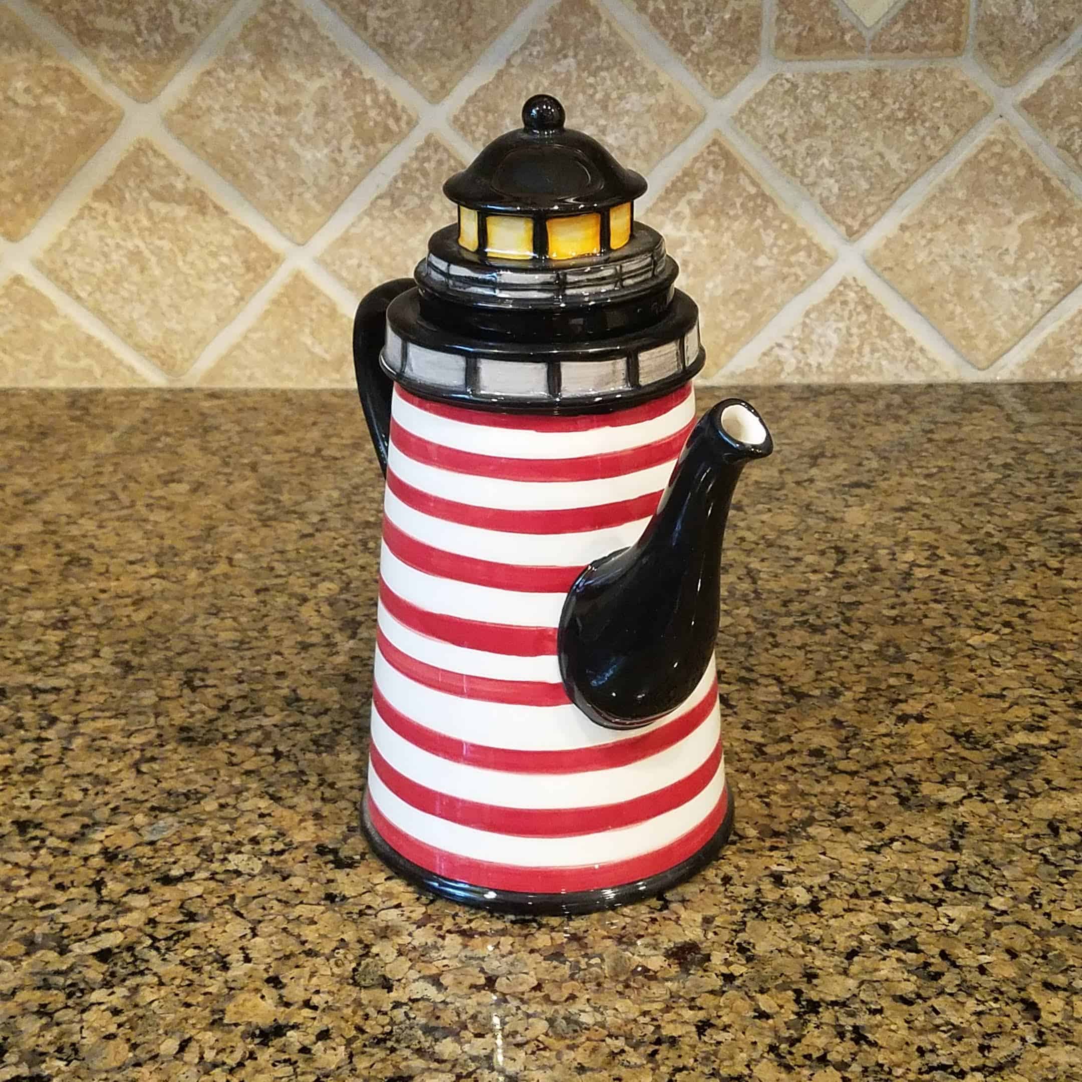 This Beacon Lighthouse Teapot is made with love by Premier Homegoods! Shop more unique gift ideas today with Spots Initiatives, the best way to support creators.