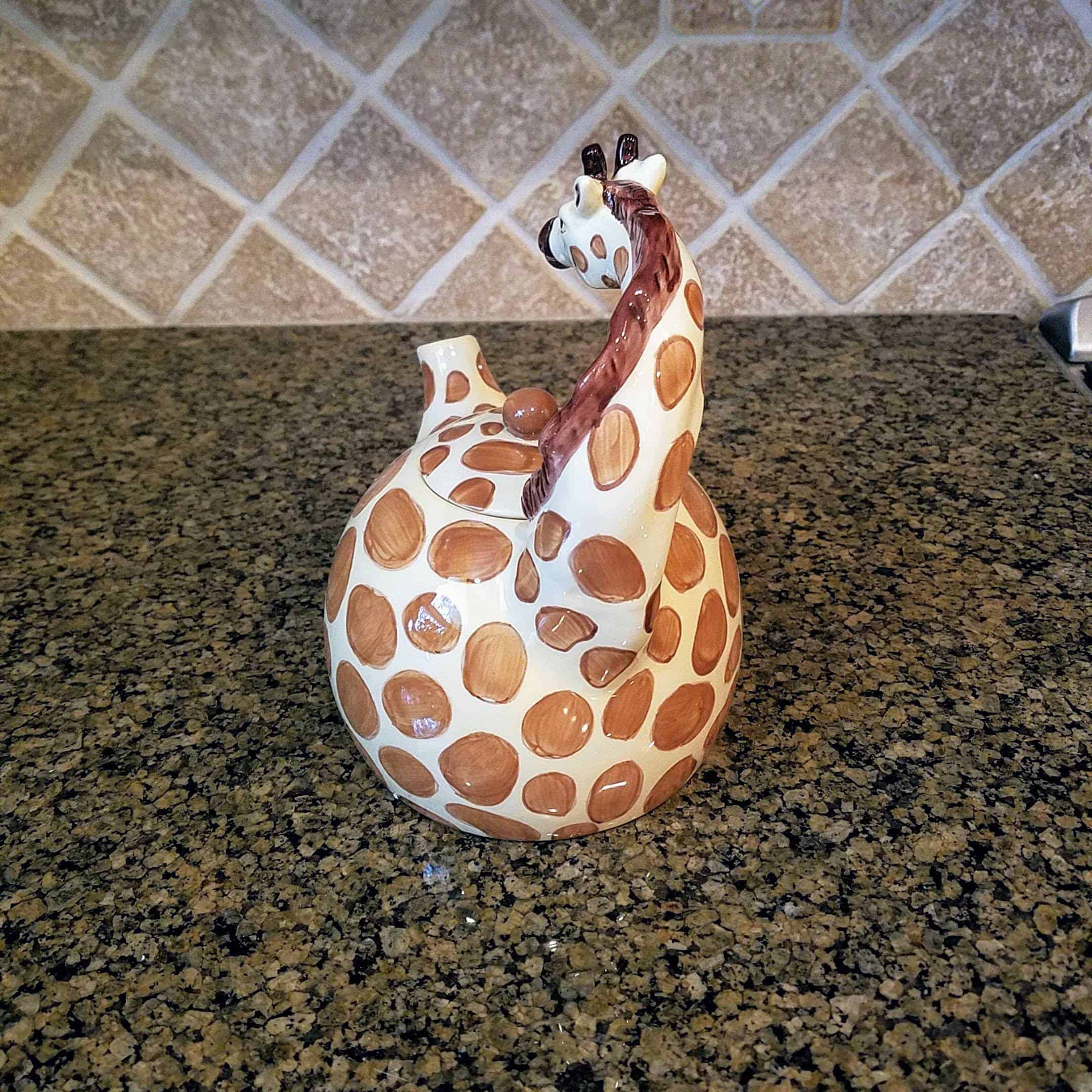 This Giraffe Teapot is made with love by Premier Homegoods! Shop more unique gift ideas today with Spots Initiatives, the best way to support creators.