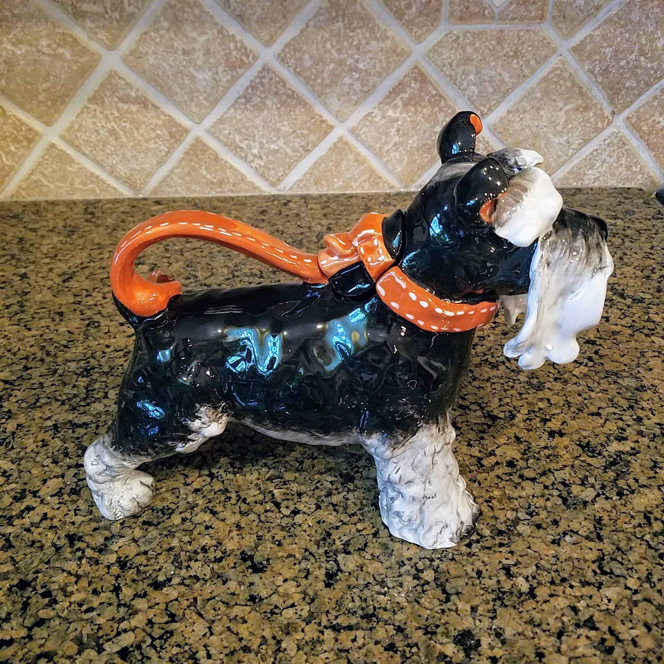 This Grey Terrier Dog Teapot Ceramic by Blue Sky Heather Goldminc Kitchen Decor is made with love by Premier Homegoods! Shop more unique gift ideas today with Spots Initiatives, the best way to support creators.