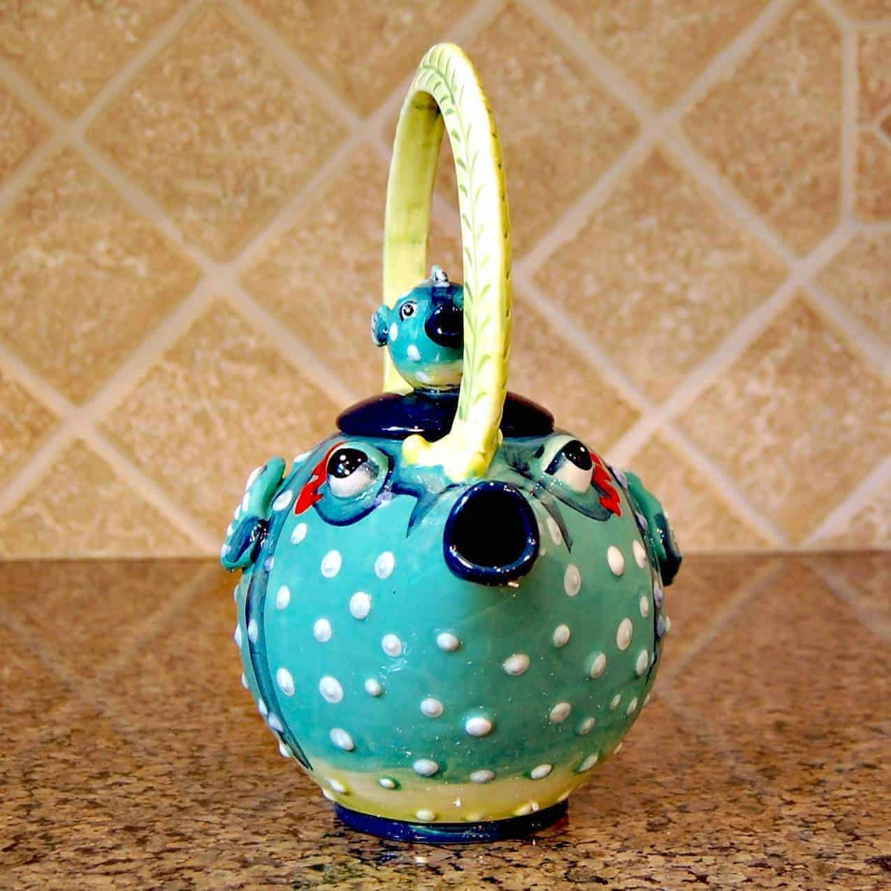 This Puffer Fish Teapot Collectible Decorative Kitchen Home Décor Blue Sky Clayworks is made with love by Premier Homegoods! Shop more unique gift ideas today with Spots Initiatives, the best way to support creators.