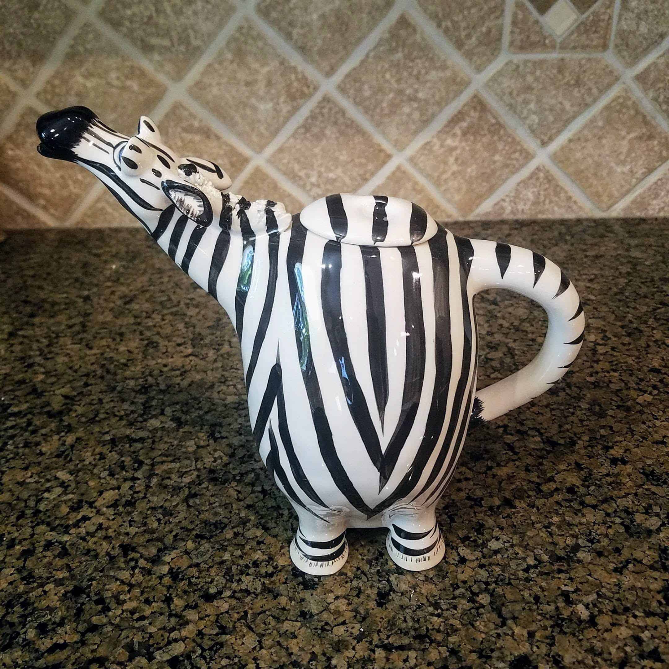 This Zebra Ceramic Teapot is made with love by Premier Homegoods! Shop more unique gift ideas today with Spots Initiatives, the best way to support creators.