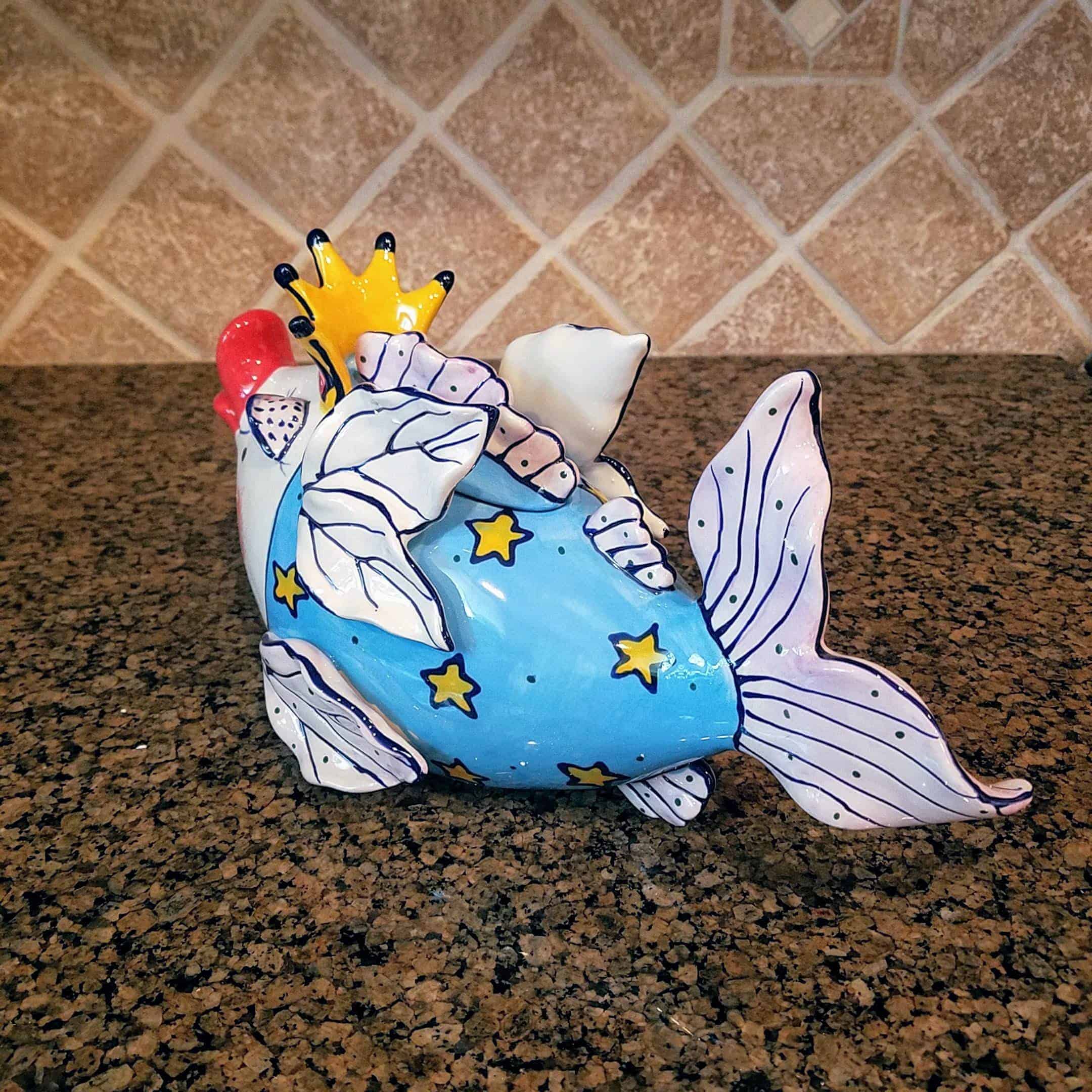 This Fairy Cod Mother Teapot is made with love by Premier Homegoods! Shop more unique gift ideas today with Spots Initiatives, the best way to support creators.