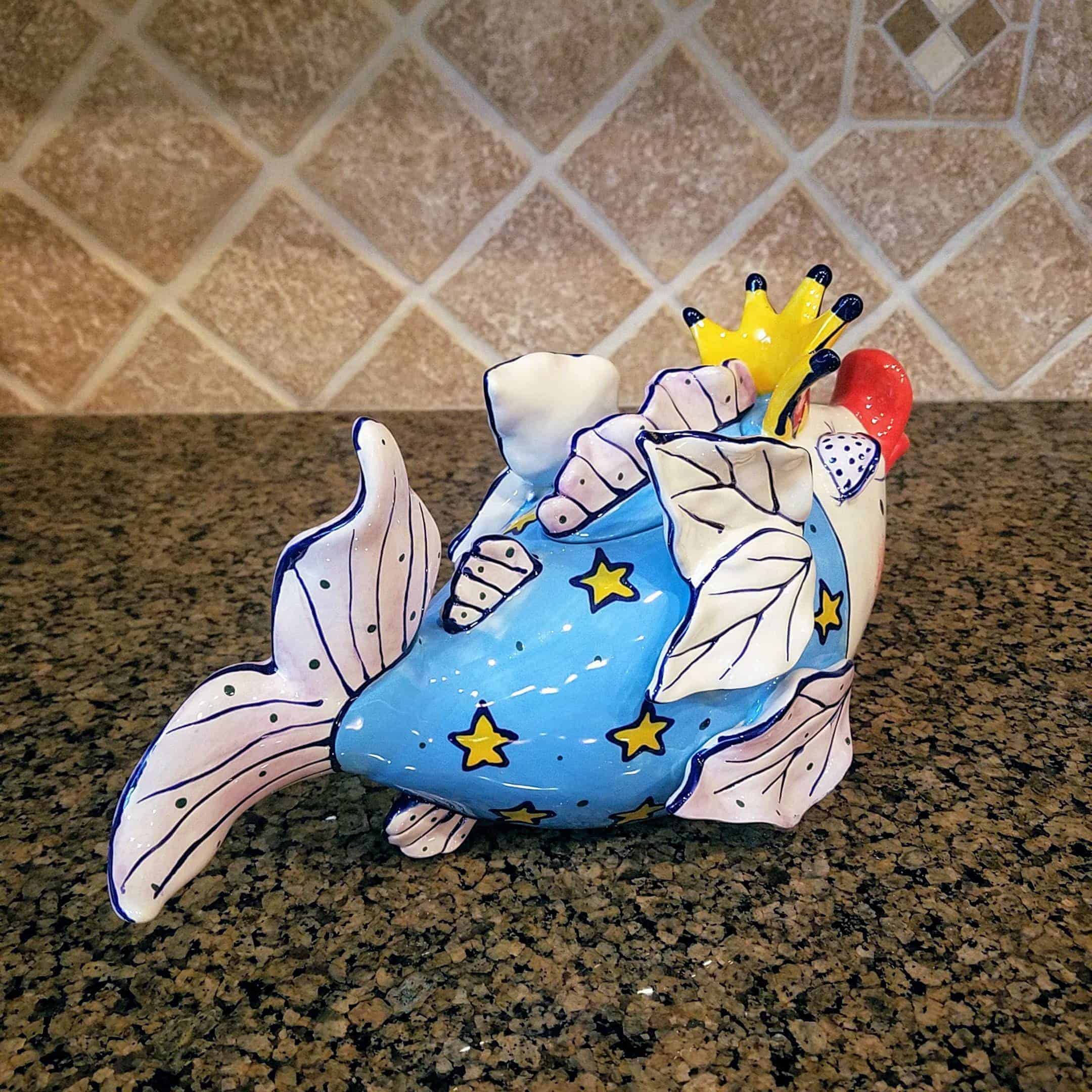This Fairy Cod Mother Teapot is made with love by Premier Homegoods! Shop more unique gift ideas today with Spots Initiatives, the best way to support creators.