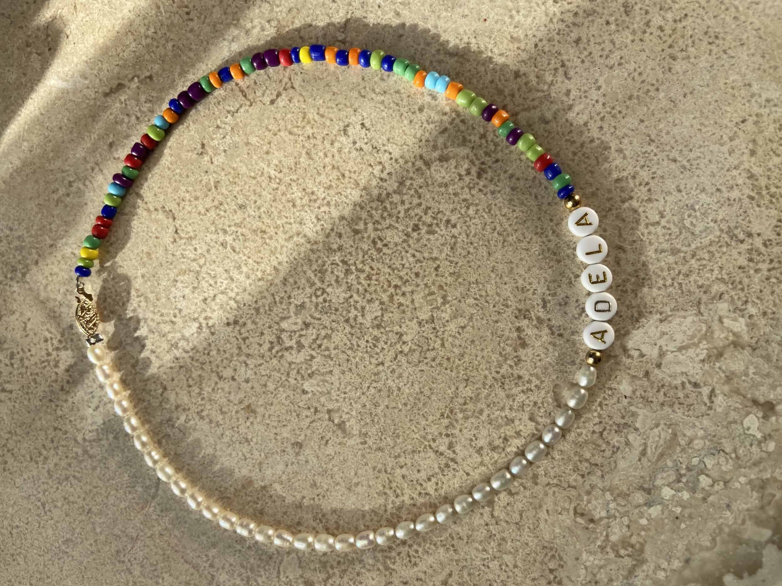 This Half Rainbow Half Pearl Necklace is made with love by Adelu Jewelry! Shop more unique gift ideas today with Spots Initiatives, the best way to support creators.