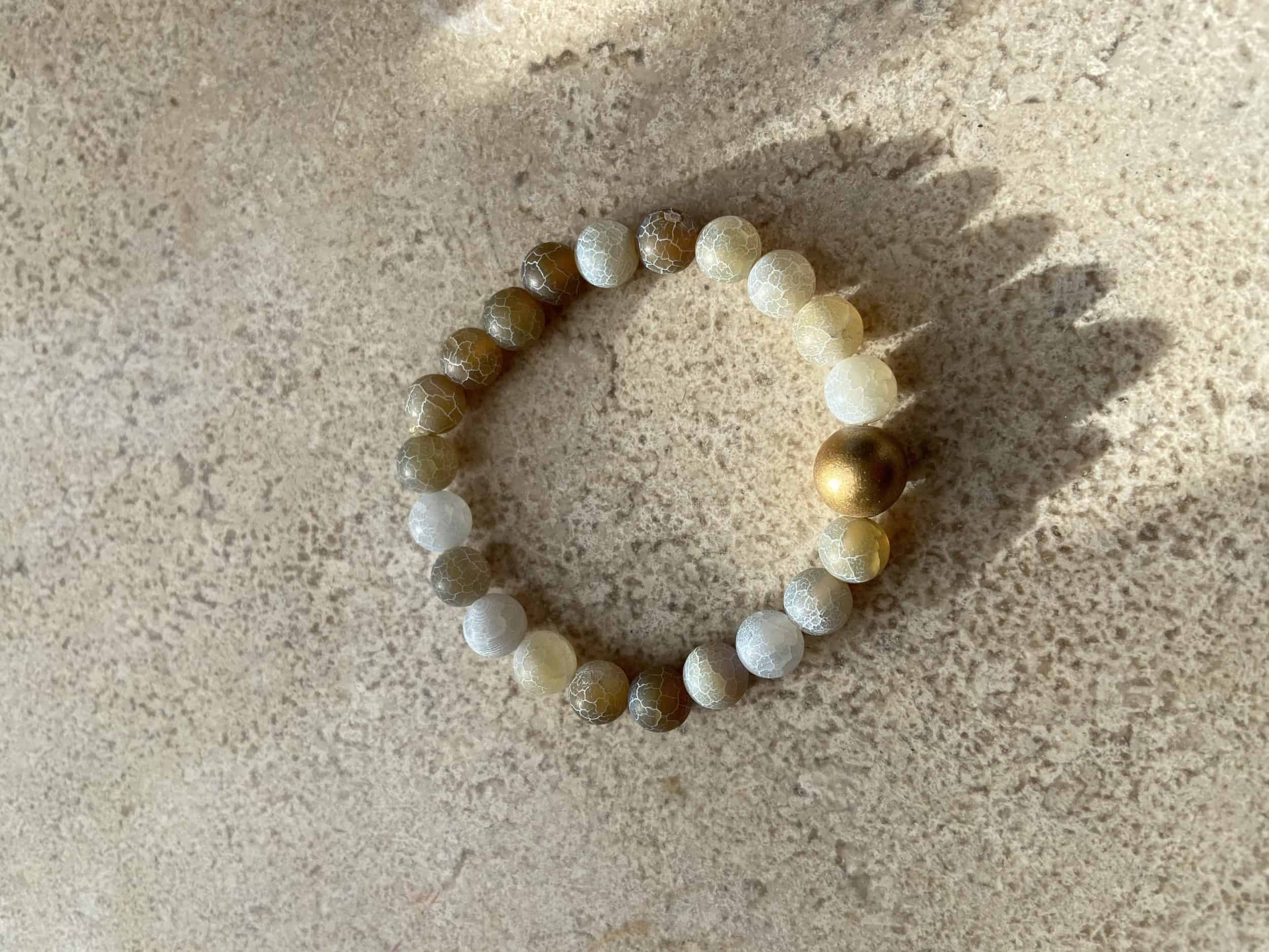 This Natural Color stretchy Bracelet with a Gold Bead is made with love by Adelu Jewelry! Shop more unique gift ideas today with Spots Initiatives, the best way to support creators.