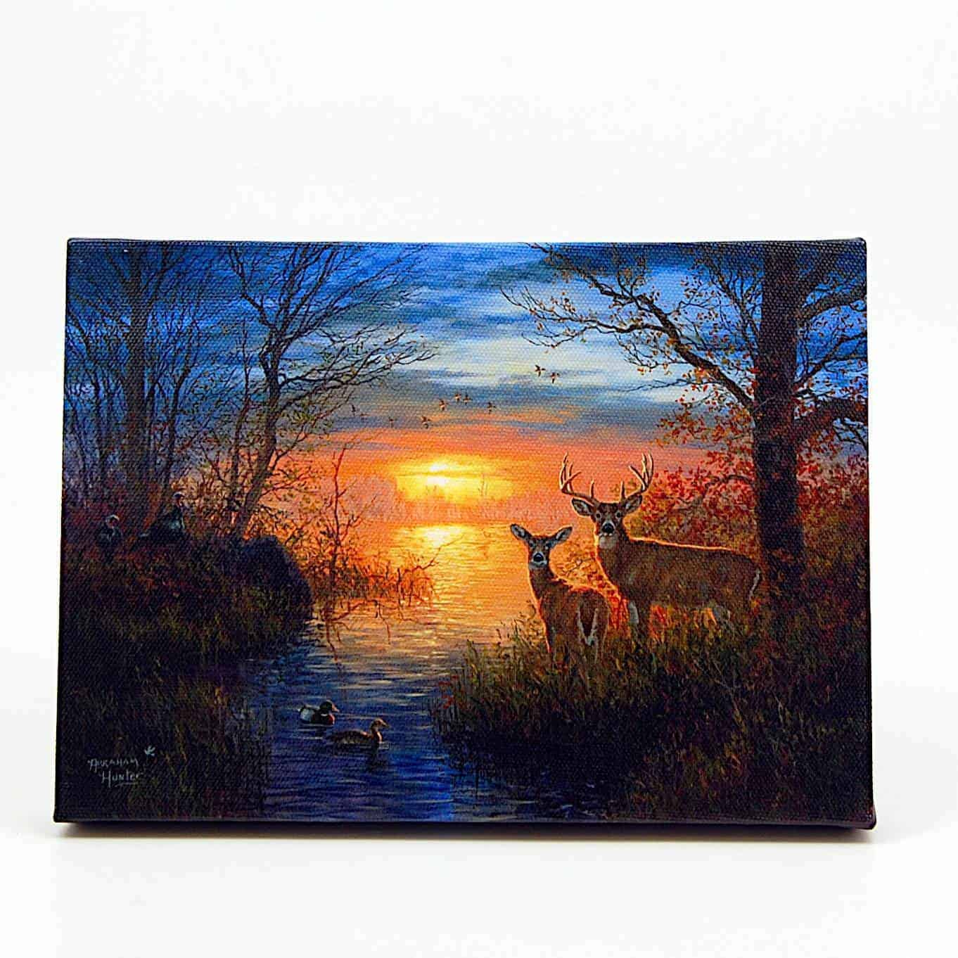 This Deer by Water at Dawn LED Light Up Lighted Canvas Wall or Tabletop Picture Art is made with love by Premier Homegoods! Shop more unique gift ideas today with Spots Initiatives, the best way to support creators.