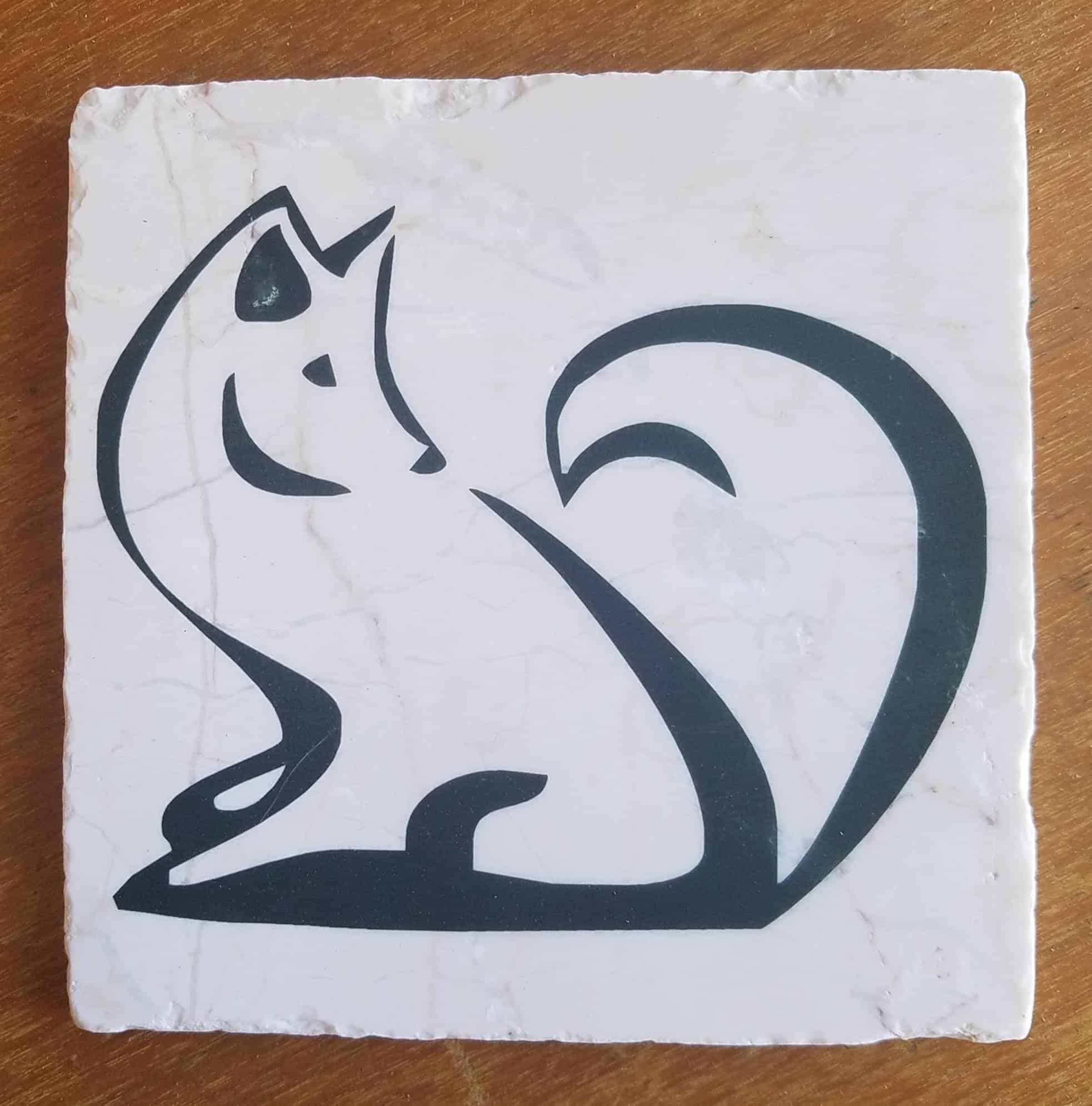 This Fox Tumbled Marble trivet is made with love by Studio Patty D! Shop more unique gift ideas today with Spots Initiatives, the best way to support creators.