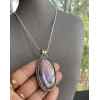 This Labradorite purple fire pendant sterling silver by Earth Karma is made with love by EARTH KARMA! Shop more unique gift ideas today with Spots Initiatives, the best way to support creators.