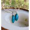 This Blue Turquoise hoops and dangle earrings by Earth Karma is made with love by EARTH KARMA! Shop more unique gift ideas today with Spots Initiatives, the best way to support creators.