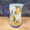 This Lemon Fruit Pitcher Embossed Decorative Floral Home by Blue Sky is made with love by Premier Homegoods! Shop more unique gift ideas today with Spots Initiatives, the best way to support creators.