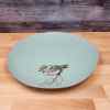 This Bird Embossed Dinner Plate 10" (27cm) Decorative Aqua Color Blue Sky Clayworks is made with love by Premier Homegoods! Shop more unique gift ideas today with Spots Initiatives, the best way to support creators.