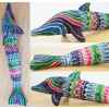 This Colorful Hand Painted Wooden Dolphin - One of a kind - Reticulated is made with love by The Creative Soul Sisters! Shop more unique gift ideas today with Spots Initiatives, the best way to support creators.
