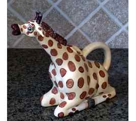 This Giraffe Ceramic Teapot Decorative Kitchen Decor New Blue Sky by Lynda Corneille is made with love by Premier Homegoods! Shop more unique gift ideas today with Spots Initiatives, the best way to support creators.