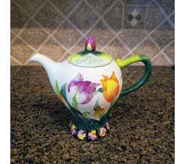 This Tulip Teapot Ceramic Kitchen Decorative Collectable Blue Sky Heather Goldminic is made with love by Premier Homegoods! Shop more unique gift ideas today with Spots Initiatives, the best way to support creators.