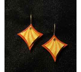 This Curvy Square Jewelry Art Earrings In Orange And Gold With Swarovski Crystals is made with love by Premier Homegoods! Shop more unique gift ideas today with Spots Initiatives, the best way to support creators.