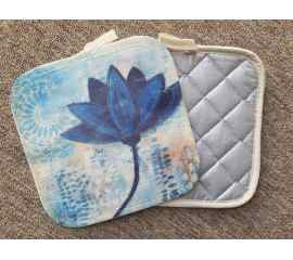 This Pot Holder - Blue Lotus is made with love by Studio Patty D! Shop more unique gift ideas today with Spots Initiatives, the best way to support creators.