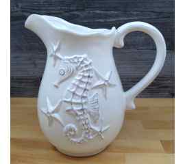 This Laguna Coastal Shell Pitcher White Decorative Sea Life Jug by Blue Sky is made with love by Premier Homegoods! Shop more unique gift ideas today with Spots Initiatives, the best way to support creators.