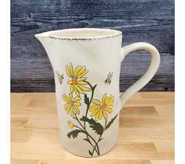 This Daisies and Bee's Summer Embossed Pitcher Decorative Floral Home by Blue Sky is made with love by Premier Homegoods! Shop more unique gift ideas today with Spots Initiatives, the best way to support creators.