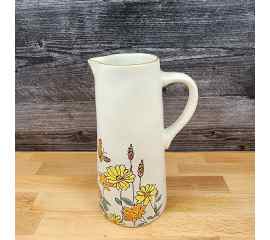This Summer Butterflies and Daisy Embossed Pitcher Decorative Floral Home by Blue Sky is made with love by Premier Homegoods! Shop more unique gift ideas today with Spots Initiatives, the best way to support creators.