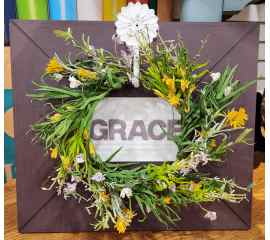 This Wreathed Grace Upcycled Frame is made with love by Perfectly Imperfect Home Boutique! Shop more unique gift ideas today with Spots Initiatives, the best way to support creators.