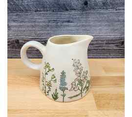 This Spring Flower Creamer Embossed by Blue Sky Clayworks is made with love by Premier Homegoods! Shop more unique gift ideas today with Spots Initiatives, the best way to support creators.