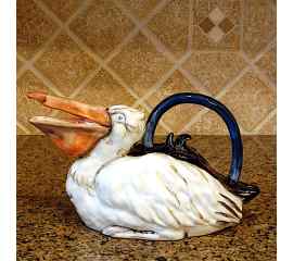 This Pelican Bird Teapot Collectible Decorative Home Décor Blue Sky Clayworks is made with love by Premier Homegoods! Shop more unique gift ideas today with Spots Initiatives, the best way to support creators.