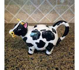 This Cow Teapot is made with love by Premier Homegoods! Shop more unique gift ideas today with Spots Initiatives, the best way to support creators.