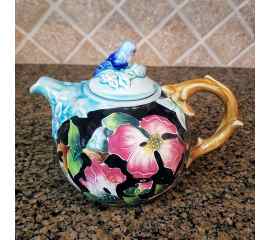 This Dogwood Teapot is made with love by Premier Homegoods! Shop more unique gift ideas today with Spots Initiatives, the best way to support creators.