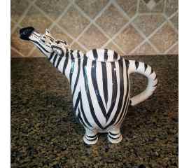 This Zebra Ceramic Teapot is made with love by Premier Homegoods! Shop more unique gift ideas today with Spots Initiatives, the best way to support creators.