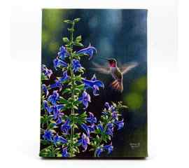 This Hummingbird and Blue Flower LED Light Up Lighted Canvas Wall or Tabletop Picture Art is made with love by Premier Homegoods! Shop more unique gift ideas today with Spots Initiatives, the best way to support creators.