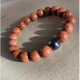 This Goldstone Chakra healing bracelet by Earth Karma is made with love by EARTH KARMA! Shop more unique gift ideas today with Spots Initiatives, the best way to support creators.