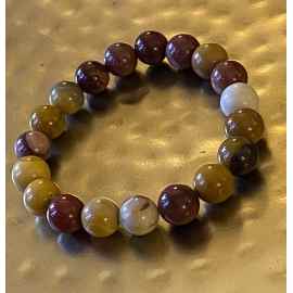 This Mookaite Jasper Chakra healing bracelet by Earth Karma is made with love by EARTH KARMA! Shop more unique gift ideas today with Spots Initiatives, the best way to support creators.
