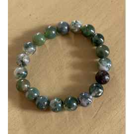 This Moss agate stretch bracelet by Earth Karma is made with love by EARTH KARMA! Shop more unique gift ideas today with Spots Initiatives, the best way to support creators.