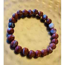 This Red Jasper healing bracelet by Earth Karma is made with love by EARTH KARMA! Shop more unique gift ideas today with Spots Initiatives, the best way to support creators.