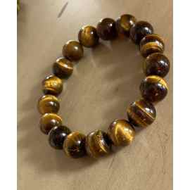 This Tigers eye Chakra healing bracelet by Earth Karma is made with love by EARTH KARMA! Shop more unique gift ideas today with Spots Initiatives, the best way to support creators.
