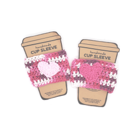 This Valentine's Day Coffee Cozies Pink and Purple is made with love by 3ChickswithSticks! Shop more unique gift ideas today with Spots Initiatives, the best way to support creators.