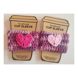 This Valentine's Day Coffee Cozies Purple is made with love by 3ChickswithSticks! Shop more unique gift ideas today with Spots Initiatives, the best way to support creators.