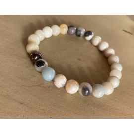 This Amazonite gemstone beaded bracelet by Earth Karma is made with love by EARTH KARMA! Shop more unique gift ideas today with Spots Initiatives, the best way to support creators.