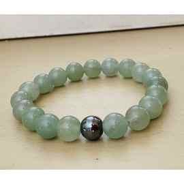 This Green jade Chakra healing bracelet by Earth Karma is made with love by EARTH KARMA! Shop more unique gift ideas today with Spots Initiatives, the best way to support creators.