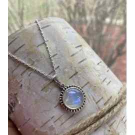 This Moonstone Moon necklace small round pendant sterling silver by Earth Karma is made with love by EARTH KARMA! Shop more unique gift ideas today with Spots Initiatives, the best way to support creators.