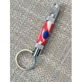 This Patriotic camouflage acrylic bottle opener keychain with chrome hardware is made with love by Blackbear Designs! Shop more unique gift ideas today with Spots Initiatives, the best way to support creators.