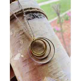 This Bonding necklace- silver gold four  circles necklace by Earth karma is made with love by EARTH KARMA! Shop more unique gift ideas today with Spots Initiatives, the best way to support creators.