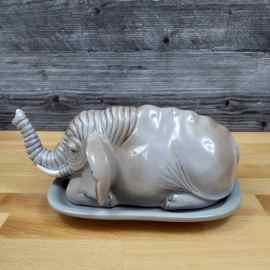 This Elephant Butter Dish Ceramic by Blue Sky Lynda Corneille is made with love by Premier Homegoods! Shop more unique gift ideas today with Spots Initiatives, the best way to support creators.