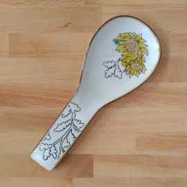 This Gilded Sunflower Spoon Rest Ceramic by Blue Sky is made with love by Premier Homegoods! Shop more unique gift ideas today with Spots Initiatives, the best way to support creators.