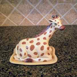 This Giraffe Butter Dish Ceramic Blue Sky Lynda Corneille is made with love by Premier Homegoods! Shop more unique gift ideas today with Spots Initiatives, the best way to support creators.
