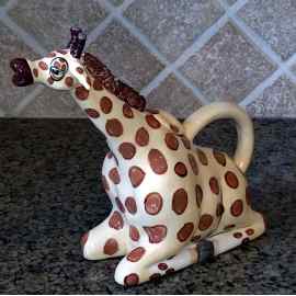This Giraffe Ceramic Teapot Decorative Kitchen Decor New Blue Sky by Lynda Corneille is made with love by Premier Homegoods! Shop more unique gift ideas today with Spots Initiatives, the best way to support creators.