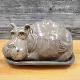 This Hippo Butter Dish Ceramic by Blue Sky Lynda Corneille is made with love by Premier Homegoods! Shop more unique gift ideas today with Spots Initiatives, the best way to support creators.